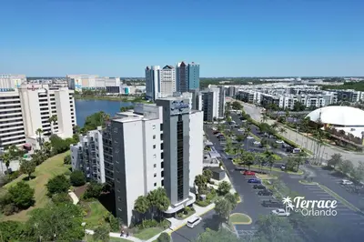 an aerial view of a city with tall buildings at Delightful Studio Condo with Garden View Balcony 7 Mins to Universal in Orlando