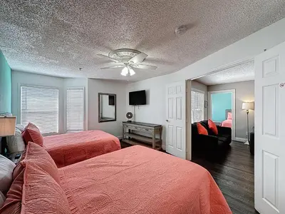 a bedroom with two beds and a ceiling fan at Two bed condo in Parkway Palms Resort in Orlando