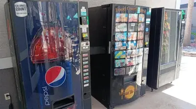 two video games vending machines are next to each other at Two bed condo in Parkway Palms Resort in Orlando