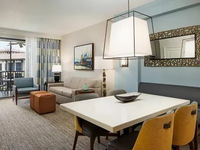 a living room with a dining table and a living room at Sheraton Vistana Villages 1BR Apartment with Resort Access in Orlando