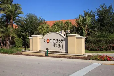 a sign that says embassy bay in front of a building at 2BR Villa Near Disney, Gated community with Pool in Kissimmee