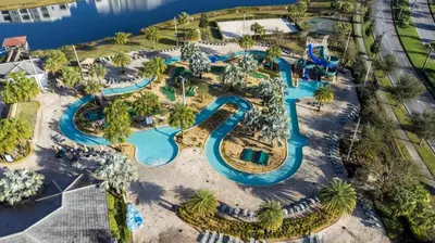 an aerial view of a pool at a resort at Casa Familiar no Storey Lake c/ Piscina in Kissimmee