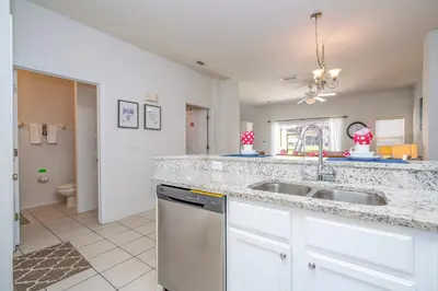 a kitchen with a sink and a counter at Bright 3B w Pool Close to Disney Encantada 8545 in Kissimmee