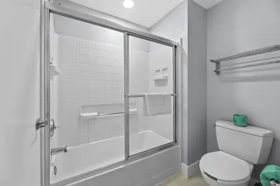 a bathroom with a shower and a toilet at Orlando 2BR Apt Full Kitchen Epic Universe in Orlando