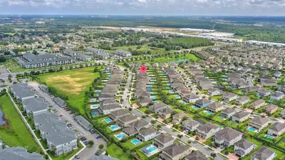 an aerial view of a city with houses at Sunset Games Retreat at Reunion Resort villa in Orlando