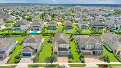 an aerial view of a residential neighborhood with houses at Sunset Games Retreat at Reunion Resort villa in Orlando