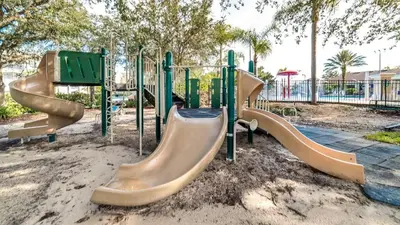 a group of slides at a playground at 2302 Butterfly Palm 102 in Kissimmee