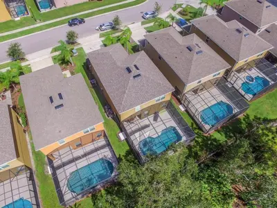 an overhead view of a house with roofs at 4 Bed Private Yard-Pool Home in Kissimmee