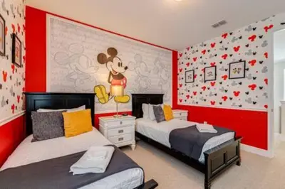 a bedroom with two beds with red walls at RVH7391 - Five Bed Luxury Disney Vacation Retreat in Orlando