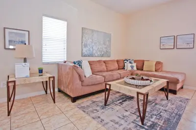 a living room with a couch and two tables at Plunge Pool Oasis Bella Vida Resort Close to Parks in Kissimmee
