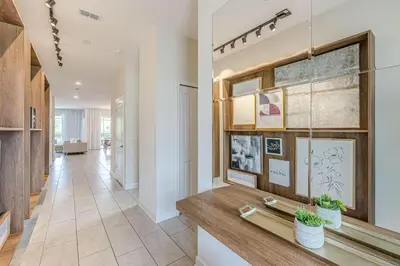 a living room with a counter and a hallway at 2807 - Storybook Escape in Kissimmee