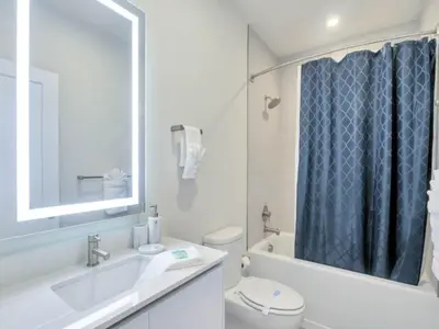 a bathroom with a sink and a toilet and a shower at TR17226BD - 4 bedr w/pool - 10 guests Near Disney in Orlando