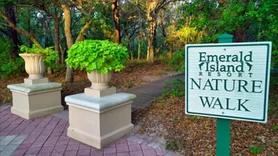 a sign that says emerald island resort and nature walk at Magic Getaway at Emerald Island in Kissimmee