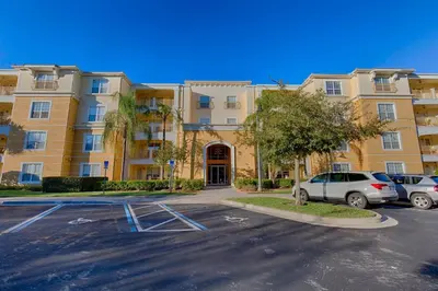 a parking lot in front of a building at Seaescape in Orlando