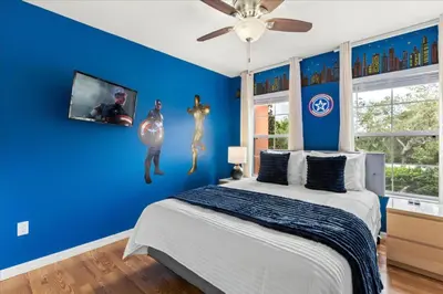 a blue bedroom with a bed and a ceiling fan at 3 Bedrooms 3 Bathrooms Encantada Resort 3097Yl in Kissimmee