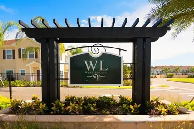 a sign for a villa in a driveway at TVPM-3230WA in Kissimmee