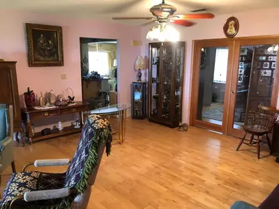 a living room with a couch and a table at Family retreat with lake views and near Disney in Saint Cloud