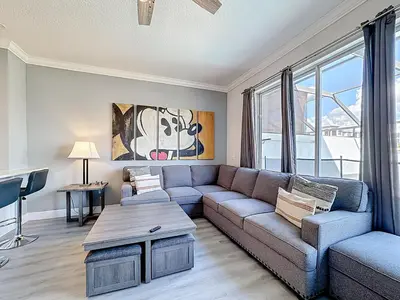 a living room with a couch and a table at T2531M Windsor Hills Resort 3Bedrm Private Pool in Orlando