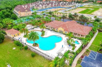 an aerial view of a pool at a resort at OAKWATER KISSIMMEE 3 BEDS in Orlando