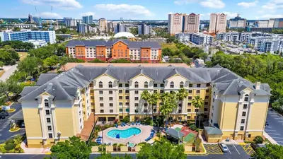 an aerial view of a resort with a swimming pool at Suite near Epic Universe & Universal, free parking in Orlando