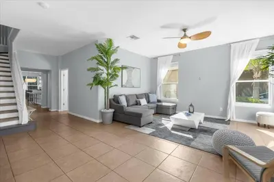 a living room with a couch and a table at TVPM-1191MBBV in Kissimmee