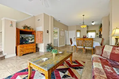 a living room with a couch and a table at 4703 Flagler Beach Way Kissimmee Florida 3BED in Kissimmee