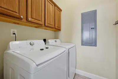 a white washer and dryer in a room at 13415 BLUE HERRON BEACH DR in Orlando