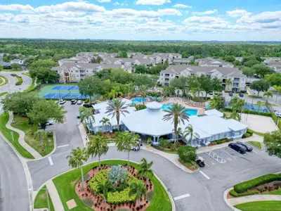 an aerial view of a resort with a parking lot at Big Condo 3 bedrooms, Pool in Kissimmee