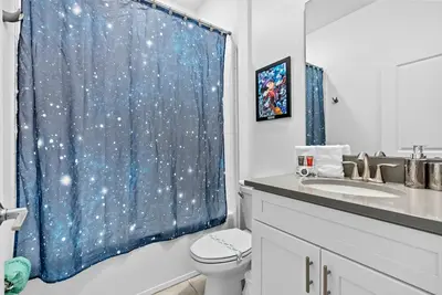 a bathroom with a star trek shower curtain at Home 07 Bedrooms6 Baths At Storey Lake in Kissimmee