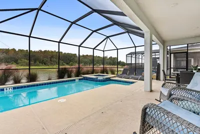 an image of a swimming pool in a house at Home 07 Bedrooms6 Baths At Storey Lake in Kissimmee