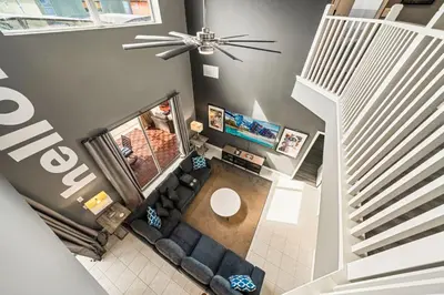 an overhead view of a living room with a couch at Emerald- 2793 in Kissimmee