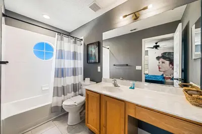 a bathroom with a sink and a toilet at Emerald- 2793 in Kissimmee