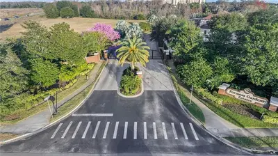 an aerial view of an empty street with a palm tree at Formosa Villa with Private Pool & 5 Miles to Disney in Orlando