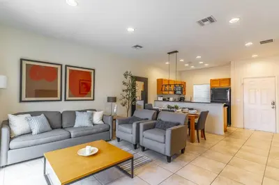 a living room with a couch and a table at 3027 Encantada in Kissimmee
