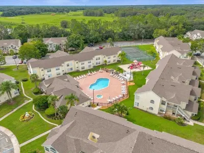 an aerial view of a home with a swimming pool at Great for Families 1-4 Kids! Near Disney, Universal, Shopping, Dining in Kissimmee