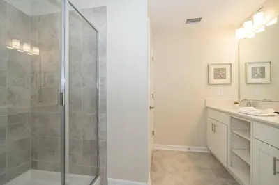 a bathroom with a shower and a sink at Resort Condo 10 Min to Disney in Kissimmee