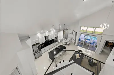 an overhead view of a kitchen and living room at Luxury Disney Retreat in Kissimmee