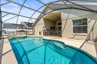 a swimming pool with a clear glass ceiling at Magical Family Getaway - 10ppl in Kissimmee