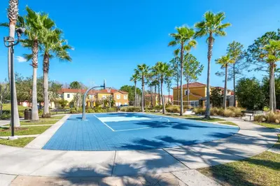 a basketball court in a park with palm trees at Palm Tree in Paradise - 10ppl in Kissimmee