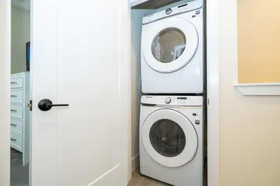 a white washer and dryer in a kitchen at Modern 3Bd Screened Pool at Serenity Resort 17322 in Orlando