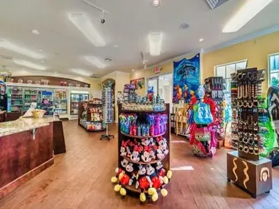 a store with a lot of merchandise in a room at WP8167SPD – Spacious 6-Bed Oasis with Pool near Disney in Kissimmee