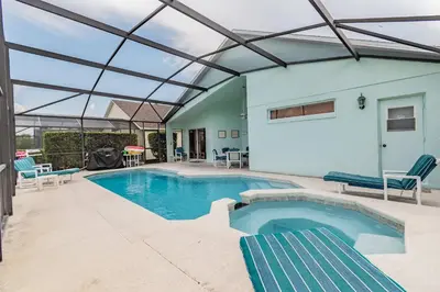 a swimming pool with a glass roof at Private Heated Pool near Disney in Kissimmee
