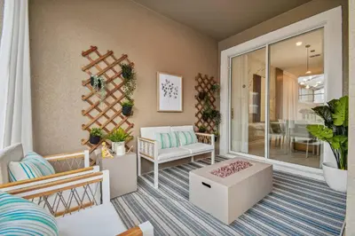 a living room with a couch and a table at Disney Retreat · Pool Themed Bedrooms in Kissimmee