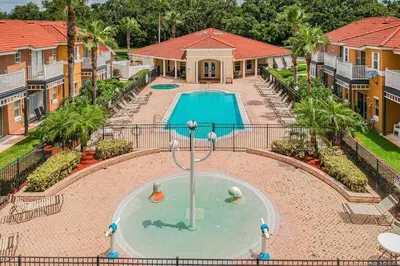 an aerial view of a swimming pool at a resort at Family Stay Close to Disney Parks in Kissimmee