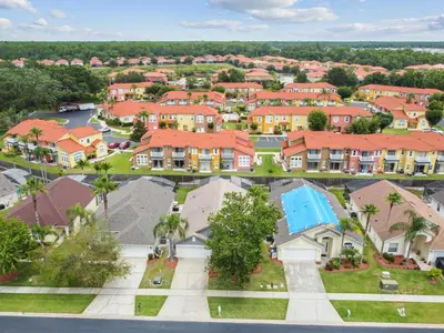 an aerial view of a residential neighborhood with houses at Family Retreat near Disney in Kissimmee
