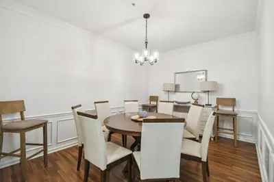 a dining room with a table and chairs at Orlando Stay Near Universal Studios in Orlando