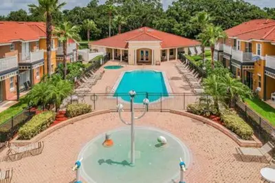 an aerial view of a swimming pool at a house at Lake Berkley · Family Home Near Disney in Kissimmee