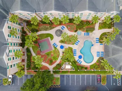 an aerial view of a resort with a swimming pool at 2 Queen Beds Theme Park in Orlando
