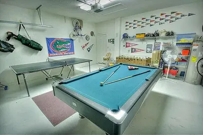 a billiard room with a pool table in it at Weikva Villa home in Kissimmee