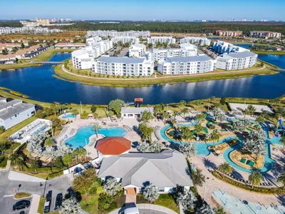 an aerial view of a resort with a pool at 4731#201- 3BR Condo 10min Disney 2 WaterParks in Kissimmee